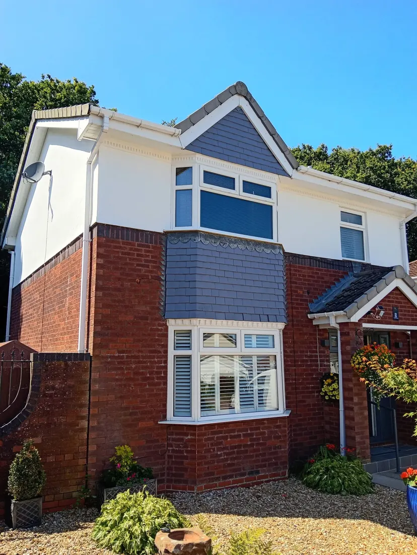 Painted house exterior in Cumbria by CH Supreme Decor